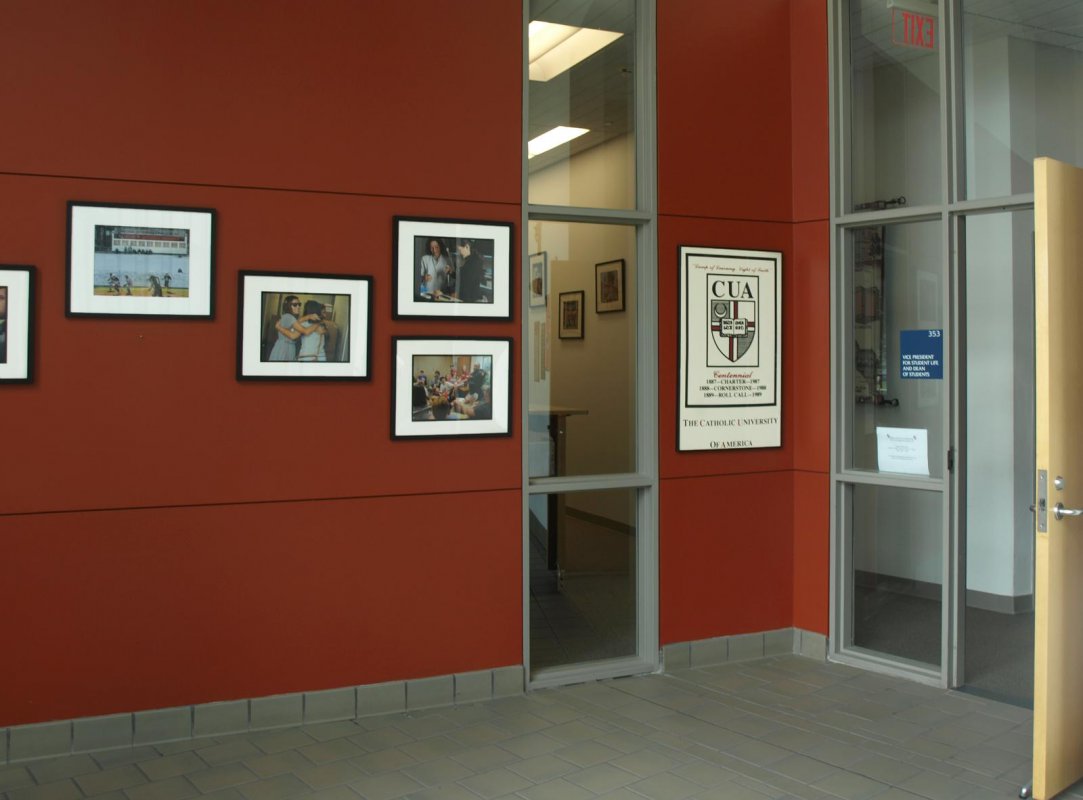 Photo display on the Dean of Students office wall